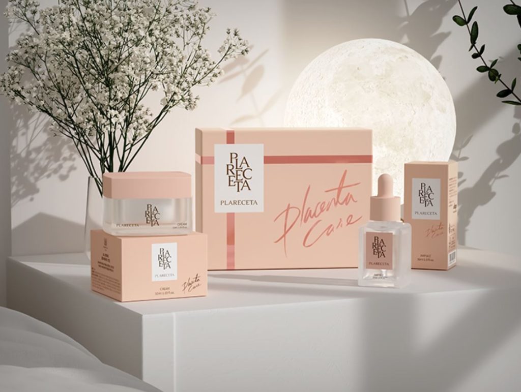BONNY & J Plareceta Cream and Ampoule Gift Set with luxurious pink packaging, displayed with flowers and elegant aesthetic.